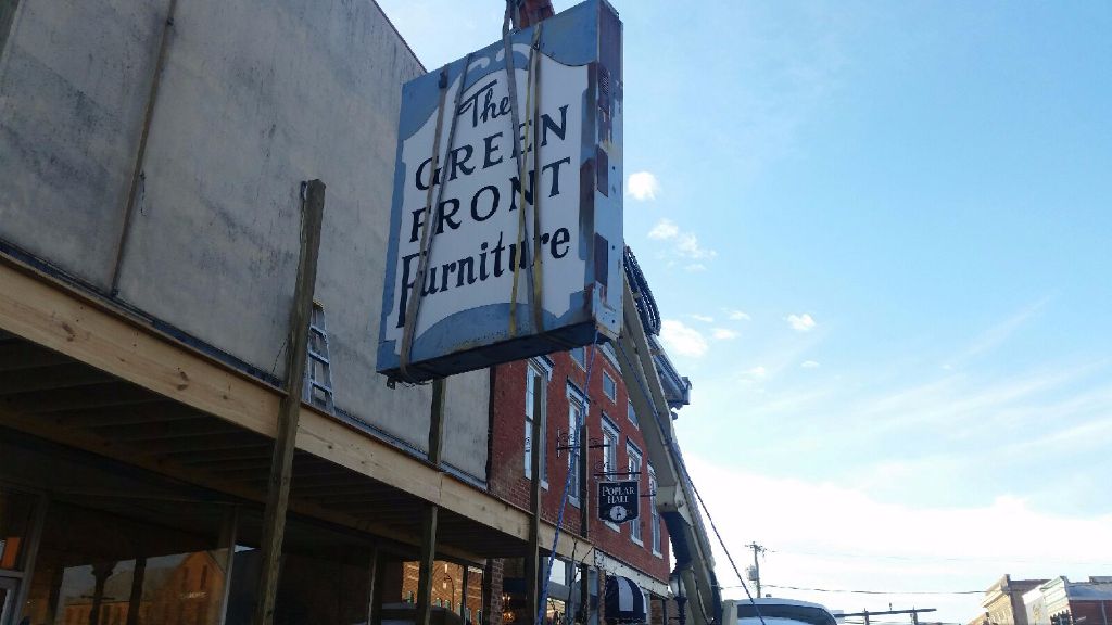 Moving the Green Front Furniture Sign