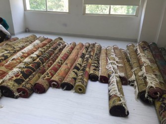 rolled up rugs