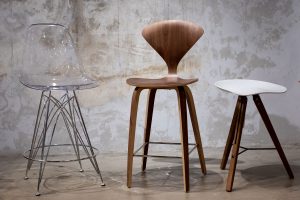 modern luxury barstools in a row made from contemporary materials