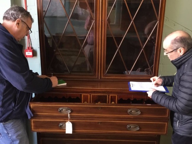 inspecting china cabinet